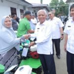 Pemkab Asahan Serahkan Bantuan Alat Mesin Pertanian (ALSINTAN) Serta Sosialisasi Penggunaannya