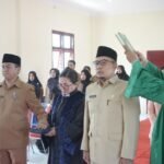 Bupati Asahan Lantik Dua Pejabat Administrator di Lingkungan Dinas Kependudukan dan Pencatatan Sipil