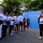 HUT 56 Sinergi Lestari, Purnabakti PT Vale Antusias Jalan Santai dan Bersihkan Lingkungan di Losari