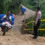 Polsek Rongkong Pasang Garis Polisi di Titik Lintasan Poros Berpotensi Longsor
